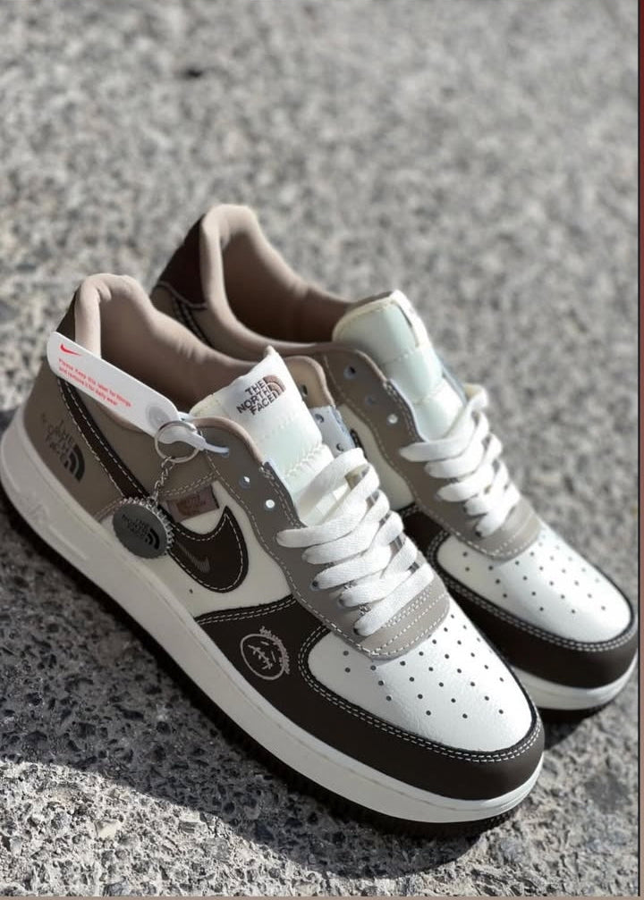 Air Force 1 Low sneakers in a brown and white colorway, featuring The North Face (Mastercopy)